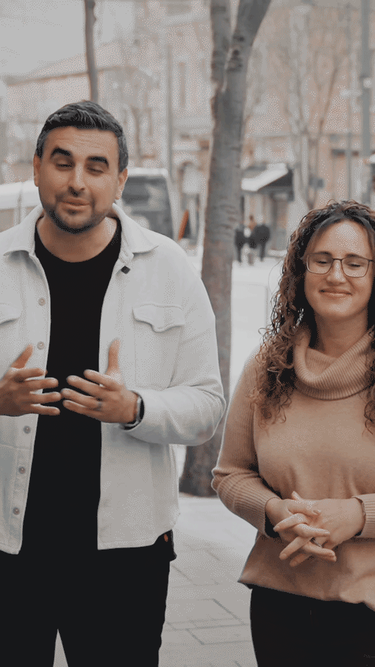 Michael and Vanessa Mistretta, co-founders of FIRM, smile at the camera.