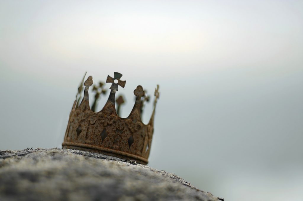 crown on top of a stone