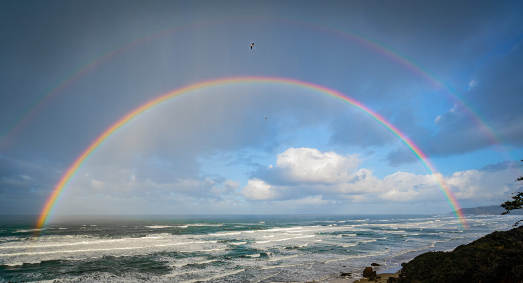 Beautiful double rainbow over the ocean off the oregon coast