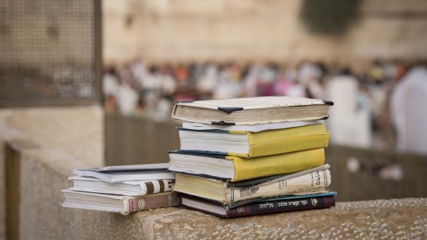 stack of books at the western wall