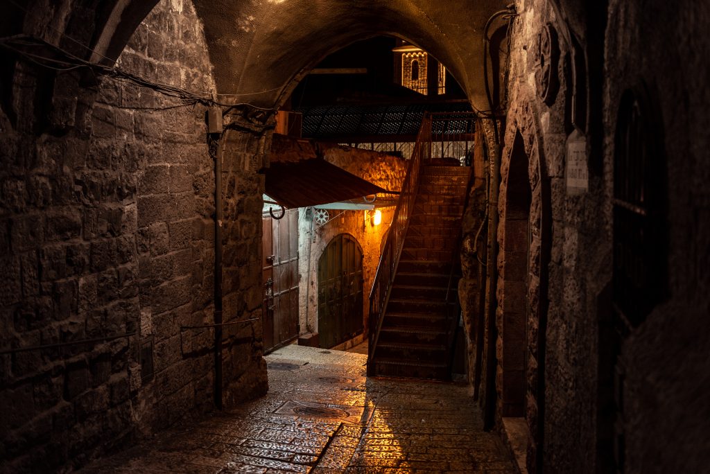 dark alley with one light in Jerusalem