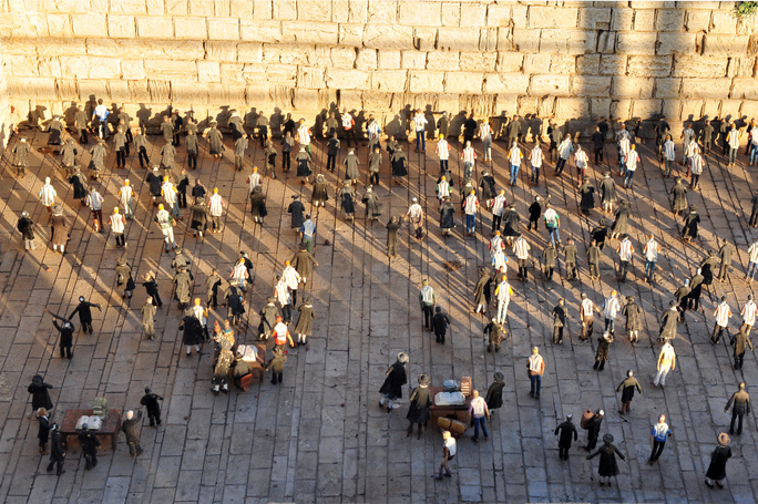jewish people walking about the western wall