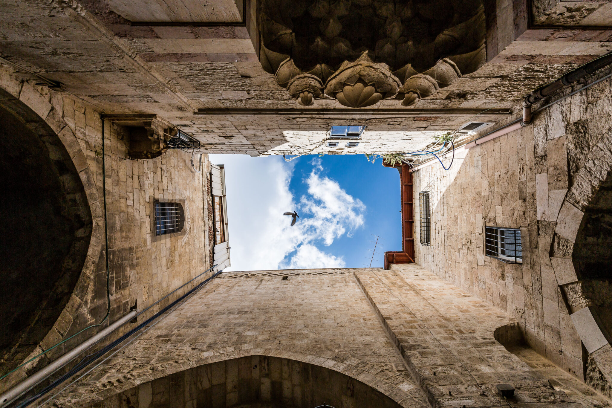 looking up at the sky in the old city of Jerusalem
