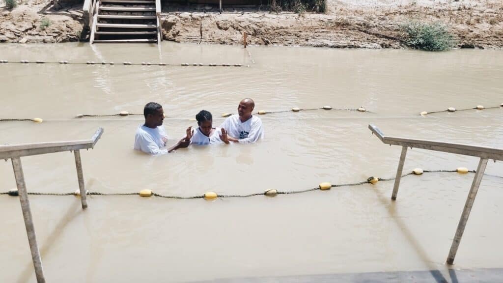 ethiopians getting baptized in the jordan river