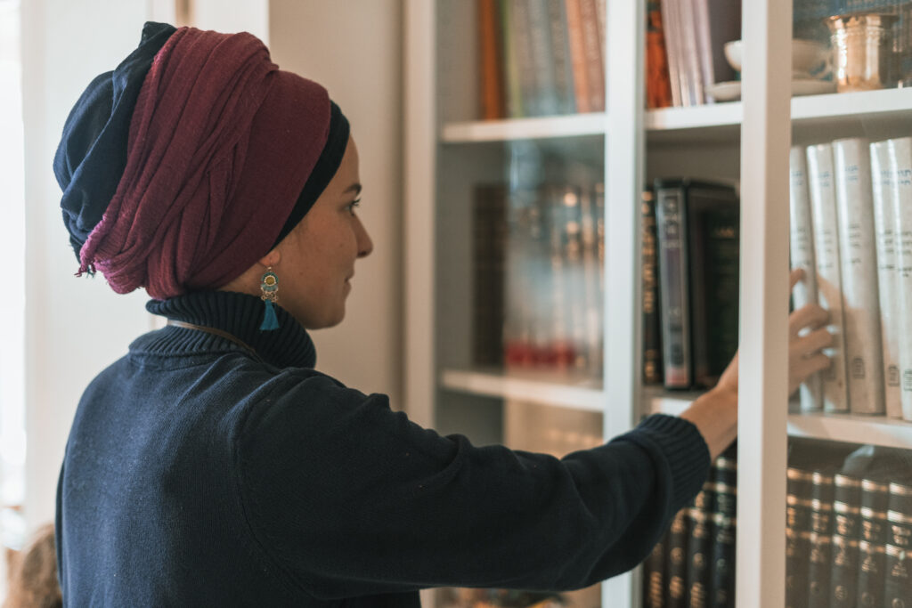 Jewish Woman looking at Books